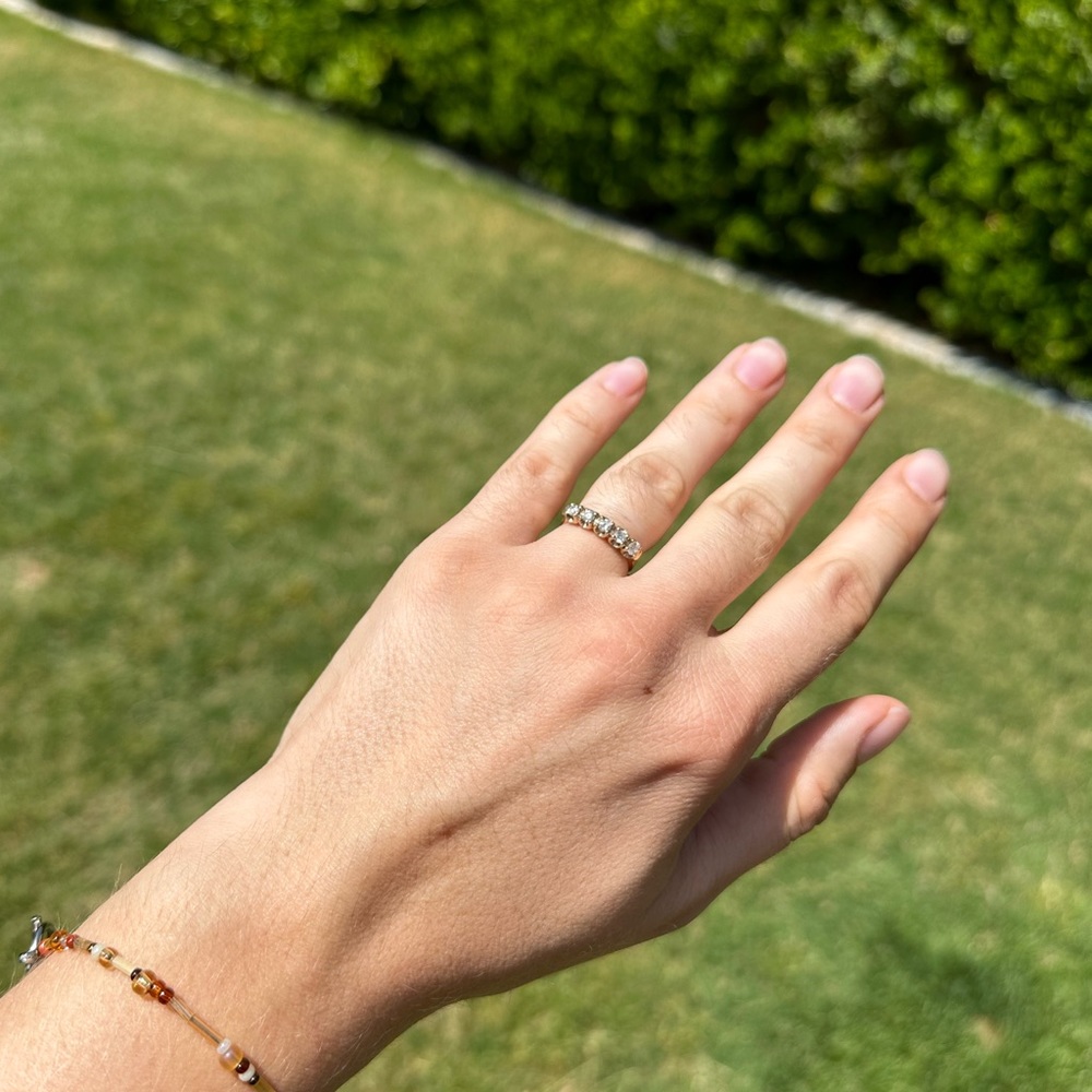 Natural diamonds in a 14K yellow gold ring with size 5